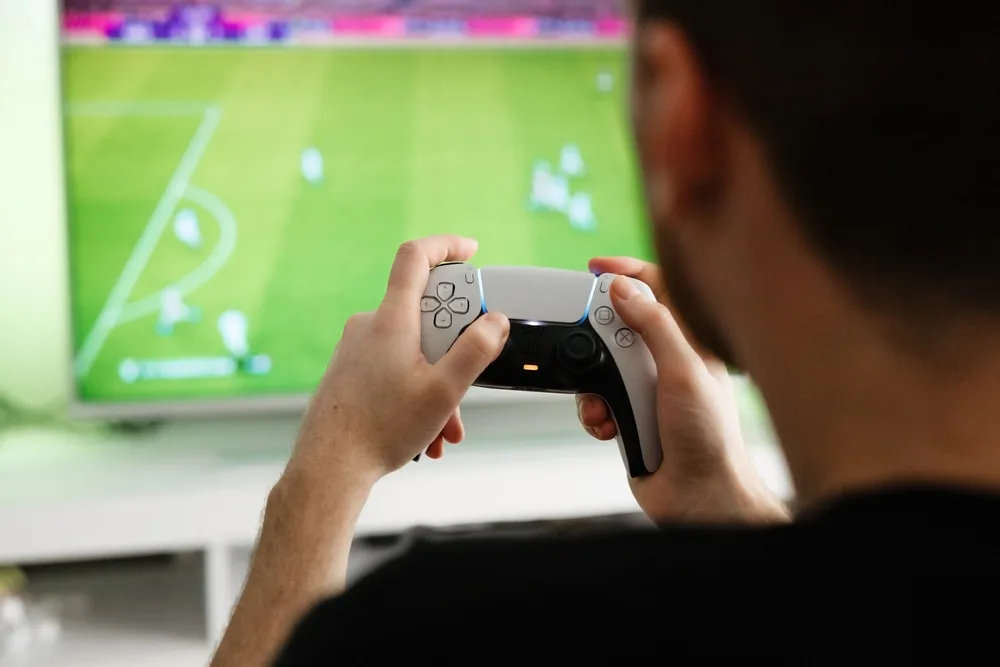 Como jogar video game na viagem? 2 futebol video game